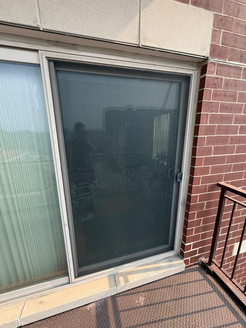 Dark glass patio slider