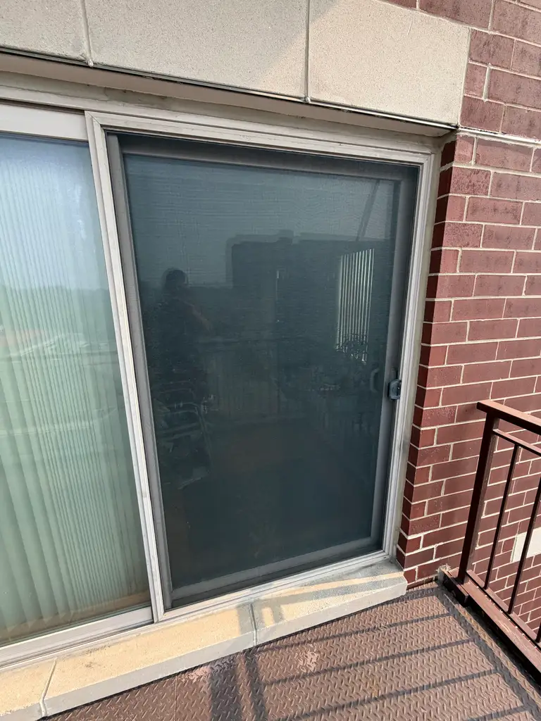 Dark glass patio slider