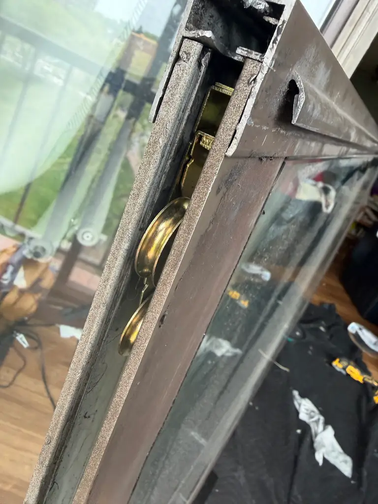Door panel edge hardware